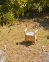 Fauteuil d'extérieur Runa en osier tressé à la main